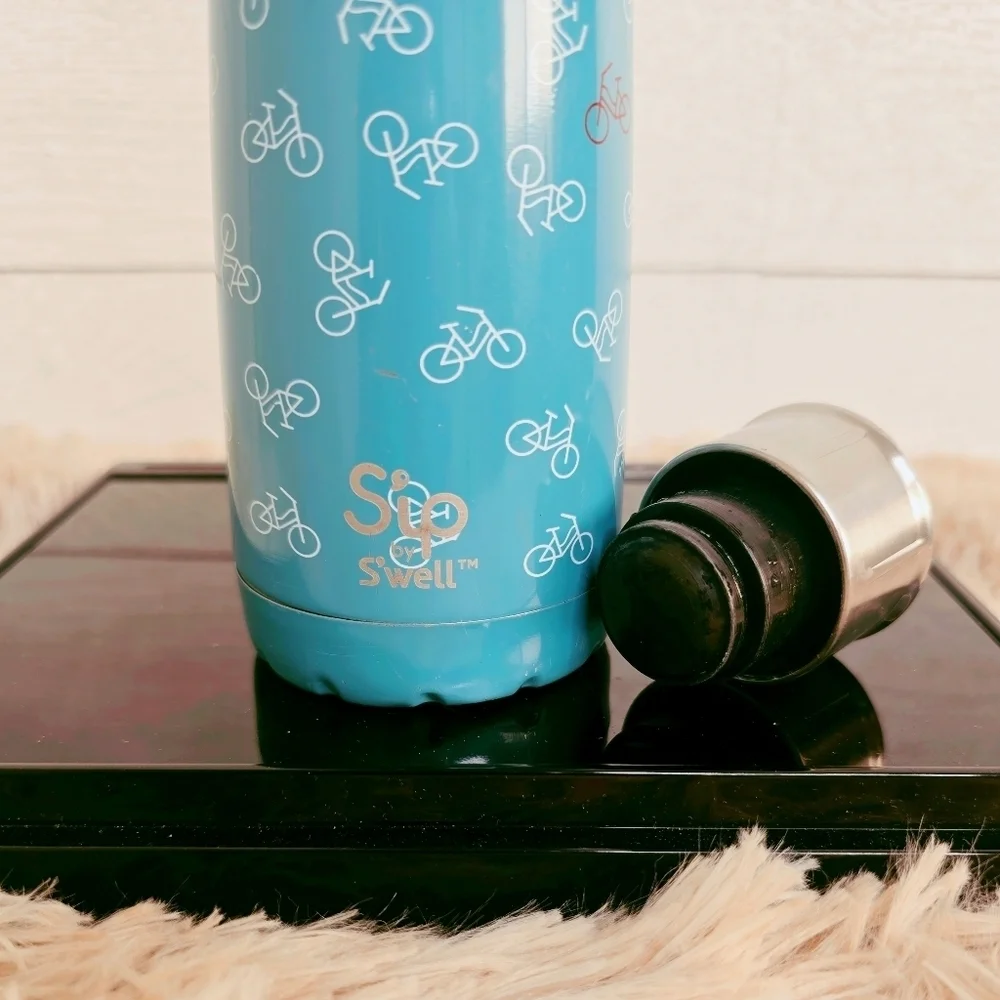 Swell Blue Bicycle Design Bottle with Silver Cap 2010